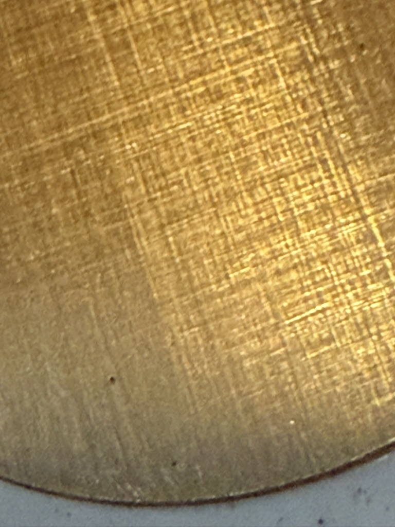 Close up on the clear-lacquer dial. Texture holds up well, no bubbling.